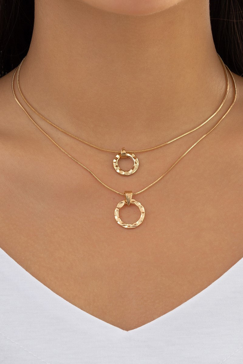 Set of two necklaces with round pendants, gold color